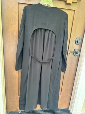 Long Duster with Prominent Open-Back Cut-Out